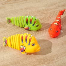 Load image into Gallery viewer, Clockwork Swinging Cartoon Fish Toys