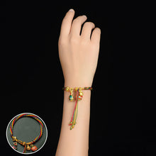 Load image into Gallery viewer, Armbånd som svelger beist i gull